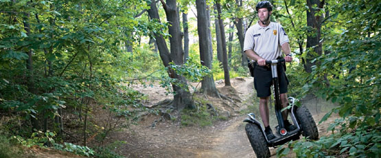 Park Ranger patroling on a Segway x2