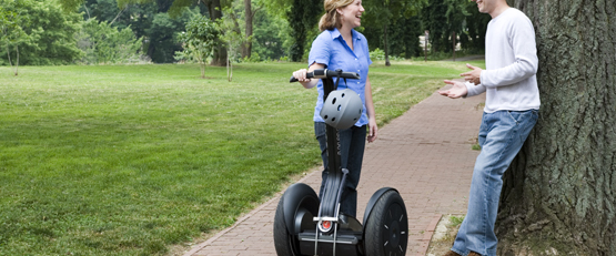 Two people dining with their Segway HT